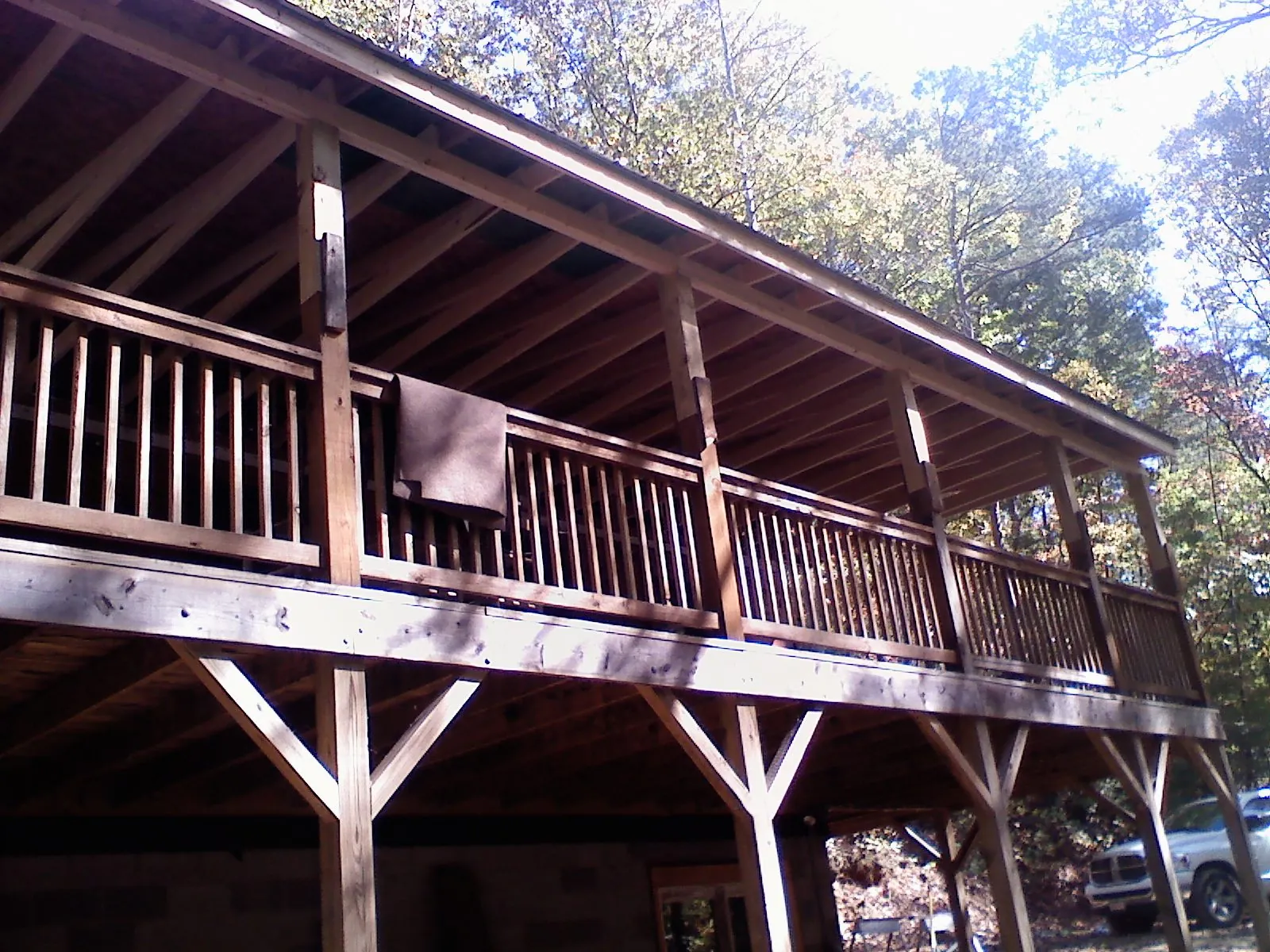 Timber framing under a new elevated porch and deck — Roof Leak Repair in Thurman by Roofing Brothers